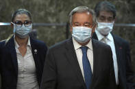 Secretary-General of the United Nations Antonio Guterres enters the Japan National Press Club in Tokyo, Monday, Aug. 8, 2022. Guterres urged countries with nuclear weapons to stick to their no-first-use commitment of their atomic arsenals, warning that the nuclear arms race has returned amid growing international tension. (AP Photo/Eugene Hoshiko)