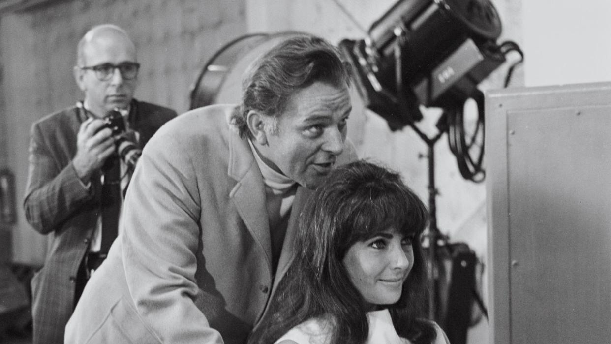 married actors elizabeth taylor 1932 2011 and richard burton 1925 1984 pose for the press before filming a scene for the drama whos afraid of virginia woolf, directed by mike nichols and based on the play by edward albee, usa, 1966 photo by archive photosgetty images