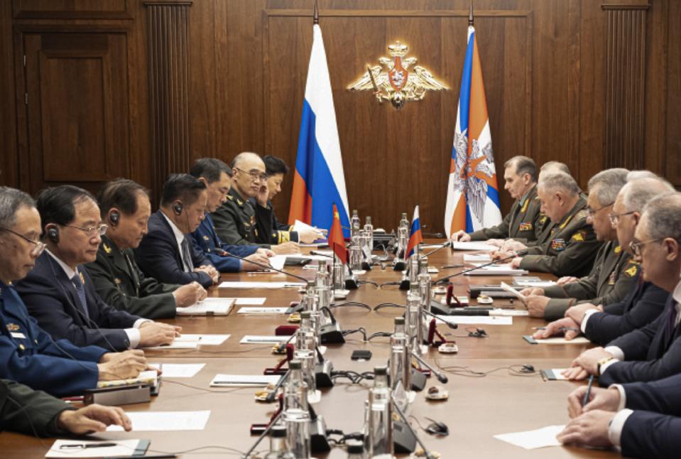 In this photo released by Russian Defense Ministry Press Service, Gen. Zhang Youxia, vice chairman of China's Central Military Commission, third left, and Russian Defense Minister Sergei Shoigu, third right, attend the talks in Moscow, Russia, Wednesday, Nov. 8, 2023. (Russian Defense Ministry Press Service via AP)