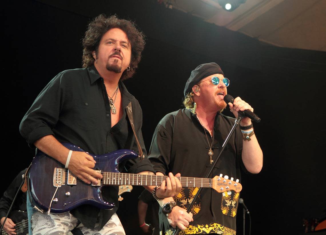 Steve Lukather, left, and Joseph Williams of the band Toto performs in concert at Pier Six Pavilion on Wednesday, Aug. 12, 2015, in Baltimore.