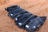 Libyan investigators find more mass graves in recaptured city