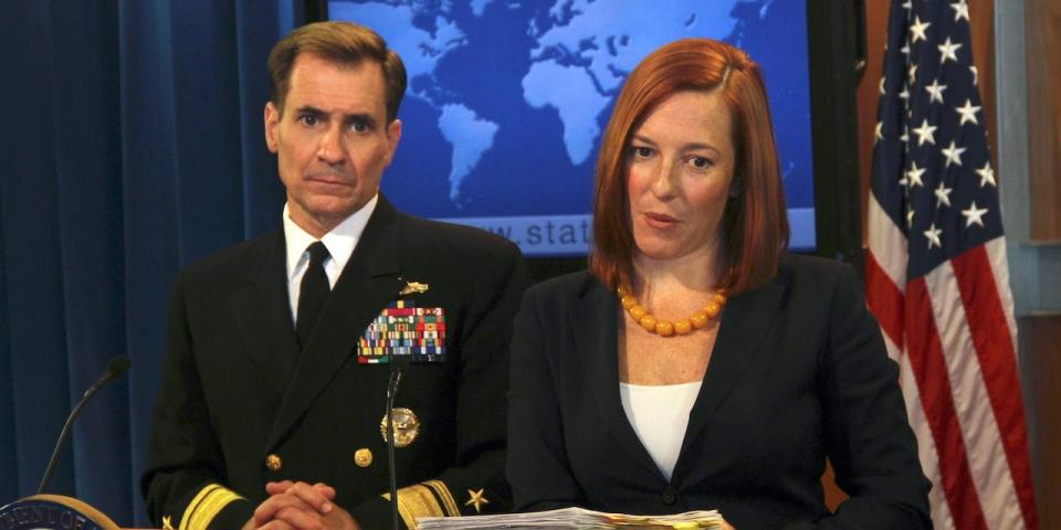 Pentagon Press Secretary Rear Admiral John Kirby (L) and U.S. State Department spokesperson Jennifer Psaki (R) hold a joint press conference at the state department in Washington DC, United States on October 16, 2014.