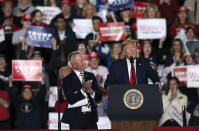 President Donald Trump speaks at a campaign rally Tuesday, Jan. 28, 2020, in Wildwood, N.J., as Rep. Jeff Van Drew, R-N.J., listens. (AP Photo/Mel Evans)