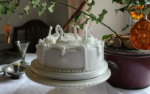 A Twelfth cake decorated with swans - Credit: National Trust 