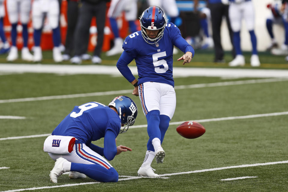 New York Giants kicker Graham Gano (5) boots a 40-yard field goal during the second half of NFL football game against the Cincinnati Bengals, Sunday, Nov. 29, 2020, in Cincinnati. (AP Photo/Aaron Doster)