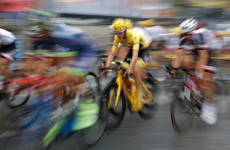 Cycling - The 104th Tour de France cycling race - The 103-km Stage 21 from Montgeron to Paris Champs-Elysees, France - July 23, 2017 - Team Sky rider and yellow jersey Chris Froome of Britain in action on the Champs Elysees. REUTERS/Christian Hartmann