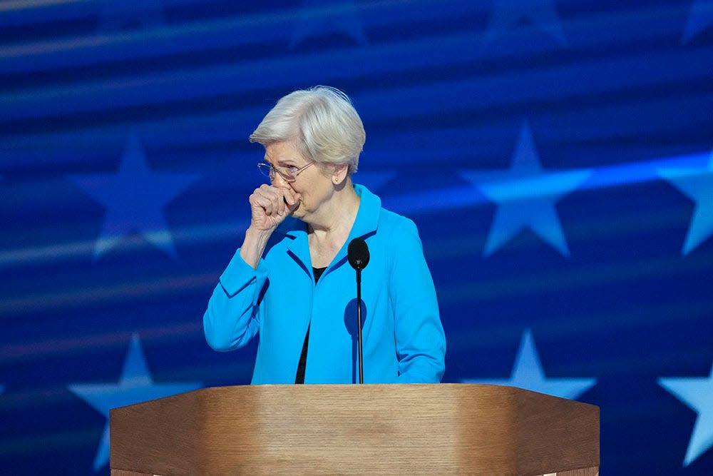 Sen. Elizabeth Warren, D-Mass., gets emotional before speaking during the final day of the Democratic National Convention at the United Center.