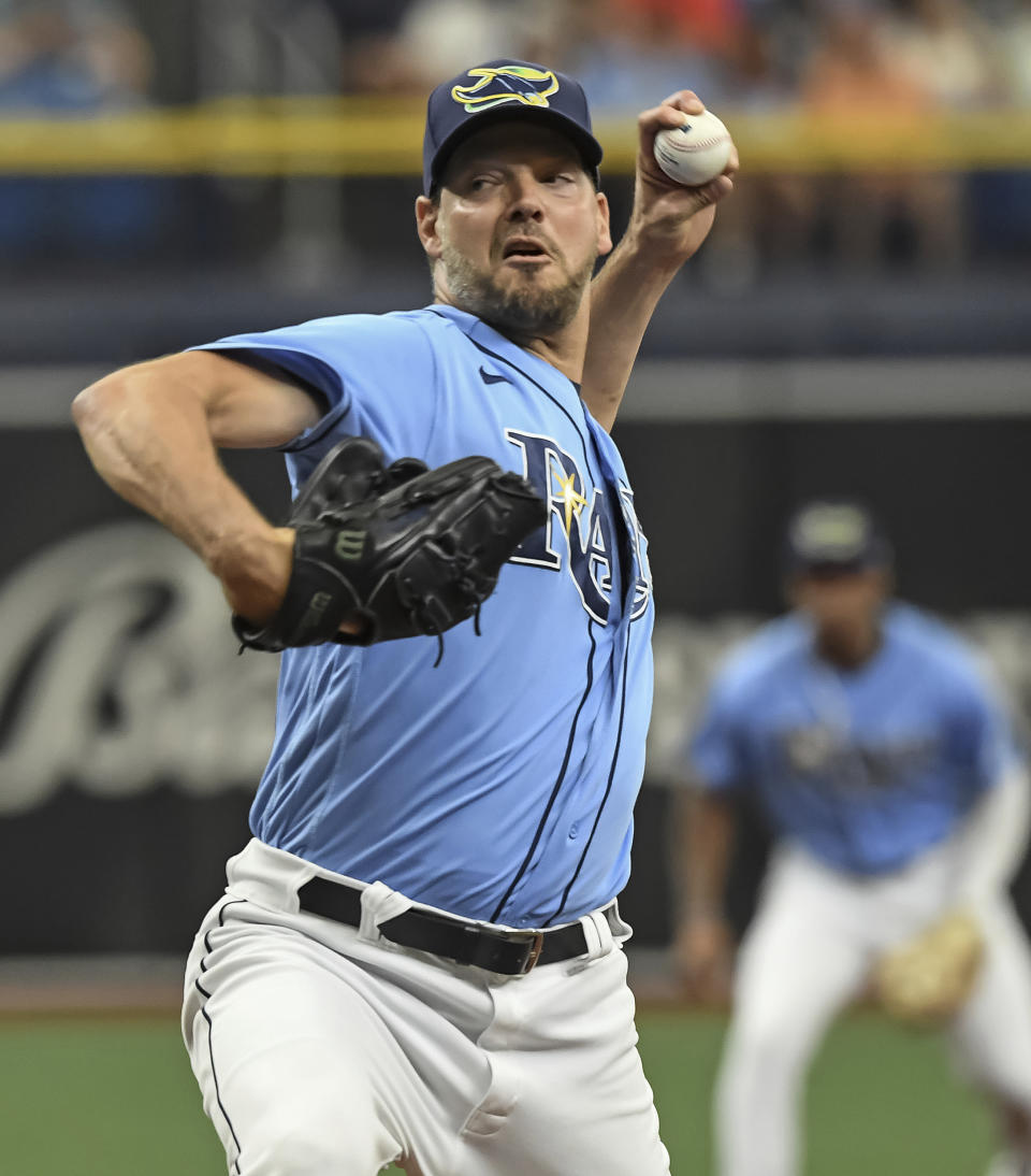 Tampa Bay Rays starter Rich Hill pitches against the Toronto Blue Jays during the first inning of a baseball game Sunday, July 11, 2021, in St. Petersburg, Fla.(AP Photo/Steve Nesius)