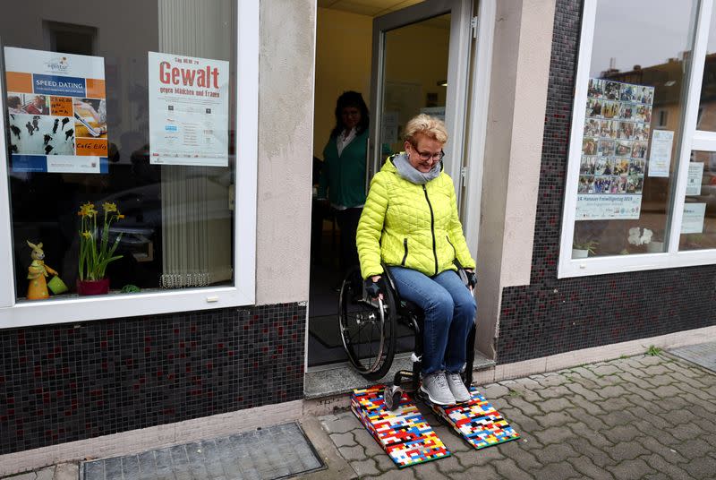 Rita Ebel, nicknamed "Lego grandma", tests one of her wheelchair ramps built from donated Lego bricks in Hanau