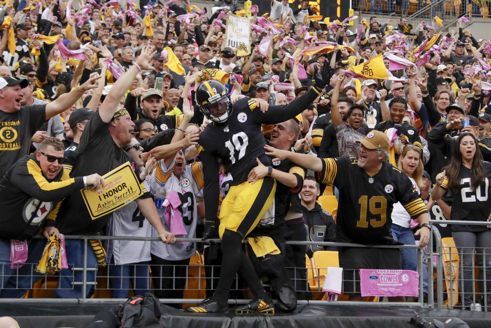 Pittsburgh Steelers wide receiver JuJu Smith-Schuster (19) celebrates with fans after scoring a touchdown in the first half of an NFL football game against the Baltimore Ravens, Sunday, Oct. 6, 2019, in Pittsburgh. (AP Photo/Don Wright)