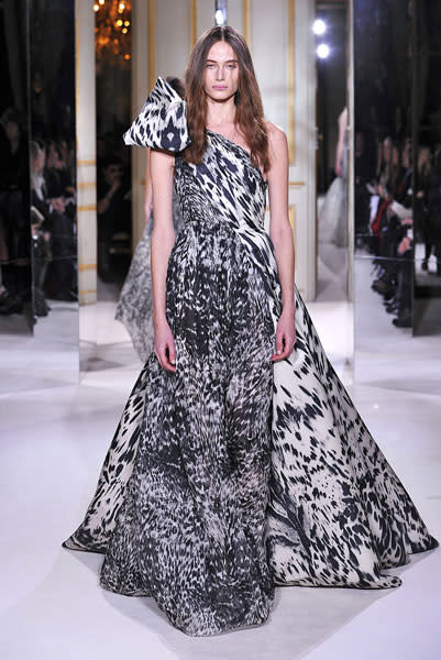 <b>Giambattista Valli SS13 <br></b><br>Models walked the catwalk in full-length animal print dresses.<br><br>© Rex