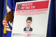 A poster of suspected Russian hacker is seen before FBI National Security Division and the U.S. Attorney's Office for the Northern District of California joint news conference at the Justice Department in Washington, U.S., March 15, 2017. REUTERS/Yuri Gripas