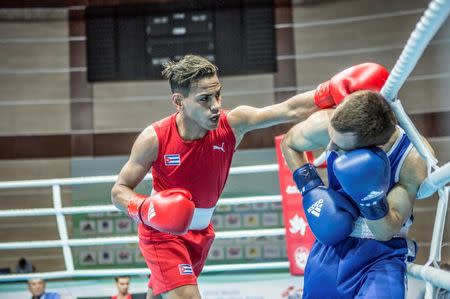 Robeisy Ramirez of Cuba in action against Arslan Khataev of Finland. Karim de la Plaine/AIBA/Handout via REUTERS