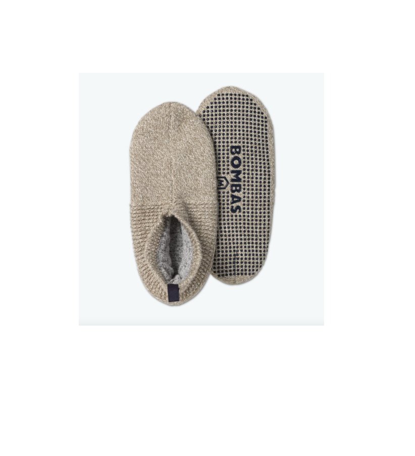 <p><a href="https://go.redirectingat.com?id=74968X1596630&url=https%3A%2F%2Fbombas.com%2Fproducts%2Fwomens-gripper-slipper-1%3Fvariant%3Dtaupe%26campignid%3D17483290273%26network%3Dx%26device%3Dc%26gclid%3DCj0KCQiAqOucBhDrARIsAPCQL1Z2xXBsw4ybZM-UnwmCxrMEQdXW17KzMc7bvCVuLPl6sDwMAzhmT0MaAjv3EALw_wcB%26size%3Dm&sref=https%3A%2F%2Fwww.cosmopolitan.com%2Fstyle-beauty%2Ffashion%2Fg37067316%2Ftravel-gift-ideas%2F" rel="nofollow noopener" target="_blank" data-ylk="slk:Shop Now;elm:context_link;itc:0;sec:content-canvas" class="link ">Shop Now</a></p><p>Women's Gripper Slipper</p><p>bombas.com</p><p>$45.00</p><span class="copyright">Bombas</span>