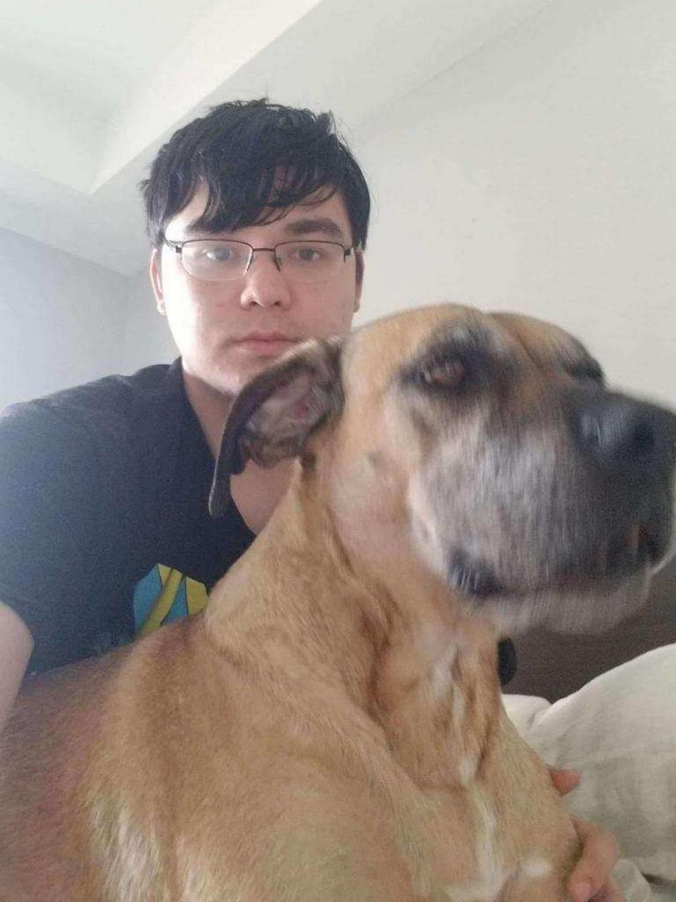 Brandon Lynch, 27, with his dog, River, was shot and killed in his home by Olathe police in December 2022. Lynch suffered paranoid schizophrenia, his family said.