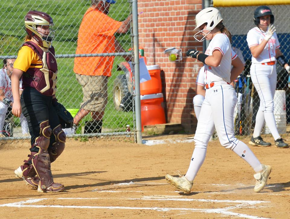 Boonsboro's Sage Haller steps on the plate to score the Warriors' first run in a 17-0 no-hit victory over Brunswick in the Class 1A West Region II quarterfinals. Boonsboro scored two runs in the first inning and 10 in the second inning.