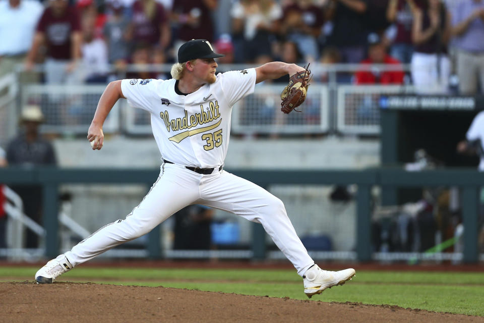 Vanderbilt pitcher Chris McElvain (35) delivers the ball during the fifth inning against Mississippi State in Game 3 of the NCAA College World Series baseball finals, Wednesday, June 30, 2021, in Omaha, Neb. (AP Photo/John Peterson)