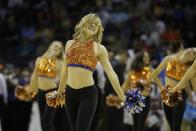 Florida cheerleaders perform during the first half in a regional semifinal game against UCLA at the NCAA college basketball tournament, Thursday, March 27, 2014, in Memphis, Tenn. (AP Photo/Mark Humphrey)