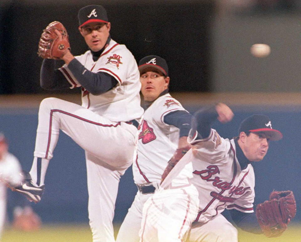 ATLANTA, UNITED STATES:  A multiple exposure shows Atlanta Braves Greg Maddux during game one of the first World Series game against the Cleveland Indians at Fulton County Stadium in Atlanta, Georgia 21 October. Maddux pitched a complete game defeating the Cleveland Indians 3-2. AFP PHOTO (Photo credit should read JEFF HAYNES/AFP/Getty Images)