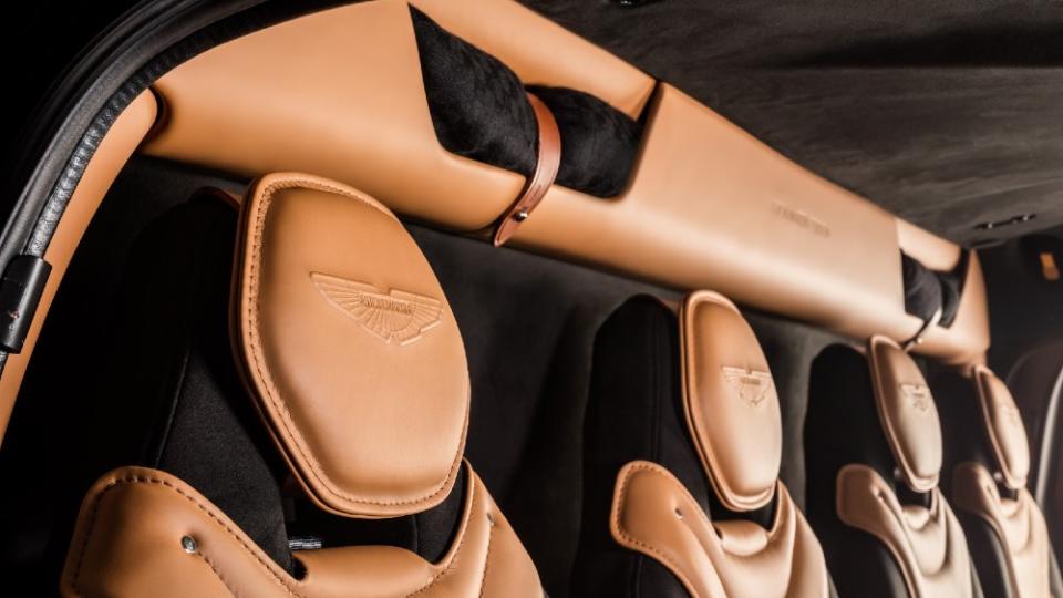 Exceptional details include the Aston Martin Logo, stitching and even the systems’ cover above the seats.