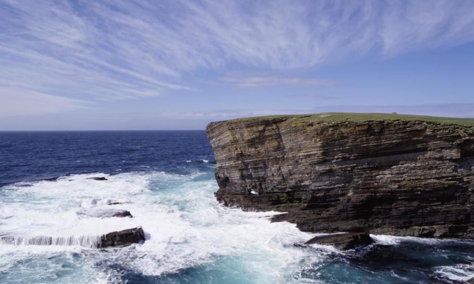 Waves beat against the cliffs at Yesnaby.