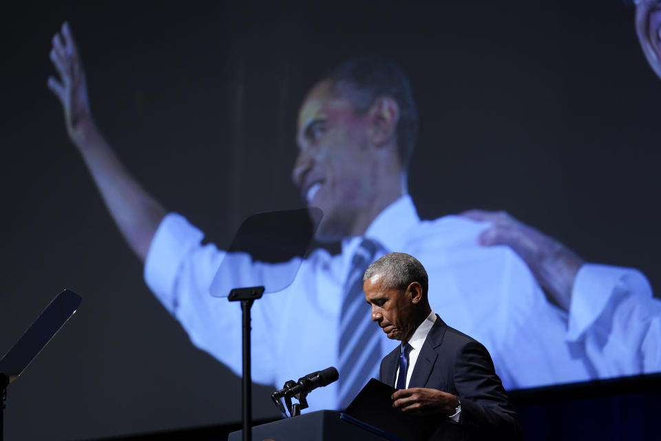 Former President Barack Obama pauses as he speaks during a memorial service for former Senate Majority Leader Harry Reid at the Smith Center in Las Vegas, Saturday, Jan. 8, 2022.(AP Photo/Susan Walsh)