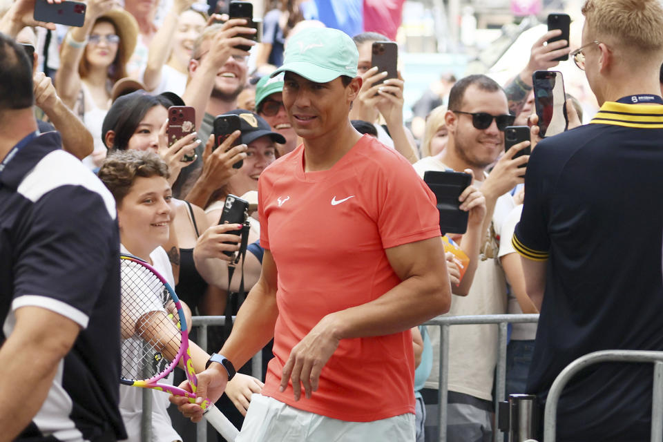 Rafael Nadal of Spain arrives for a public appearance in the Queen Street Mall ahead of the Brisbane International tennis tournament in Brisbane, Australia, Friday, Dec. 29, 2023. (AP Photo/Tertius Pickard)