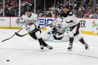 Metropolitan Division's Sidney Crosby, of the Pittsburg Penguins (87) and Atlantic Division's David Pastrnak, of the Boston Bruins (88) battle for the puck during the NHL All Star hockey game, Saturday, Feb. 4, 2023, in Sunrise, Fla. (AP Photo/Lynne Sladky)