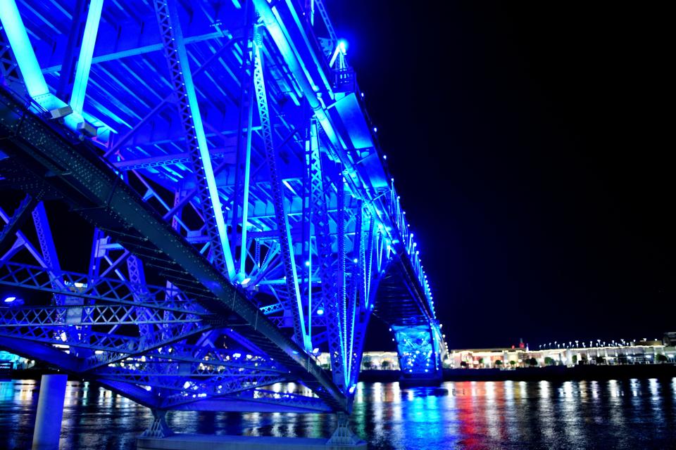 Project Celebration and The Gingerbread House’s light the Bakowski Bridge up with teal and navy to kick-off Sexual Assault Awareness Month and Child Abuse Prevention Month Wednesday evening, April 3, 2024.
