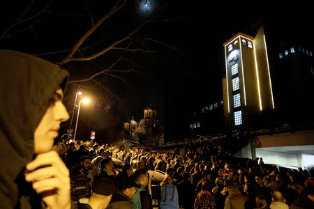 Protesters briefly broke into Serbia's state television building during a protest against Serbian President Aleksandar Vucic and his government in central Belgrade, Serbia, March 16 , 2019. REUTERS/Djordje Kojadinovic