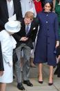 <p>Prince Harry and Meghan Markle share a sweet moment with Queen Elizabeth after the wedding of Princess Eugenie and Jack Brooksbank.</p>