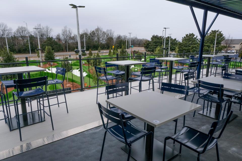 Jan 18, 2024; Tuscaloosa, Alabama, USA; An eating area overlooks the putting greens at the PopStroke opening Thursday morning. This is the tenth location nationwide for the company.