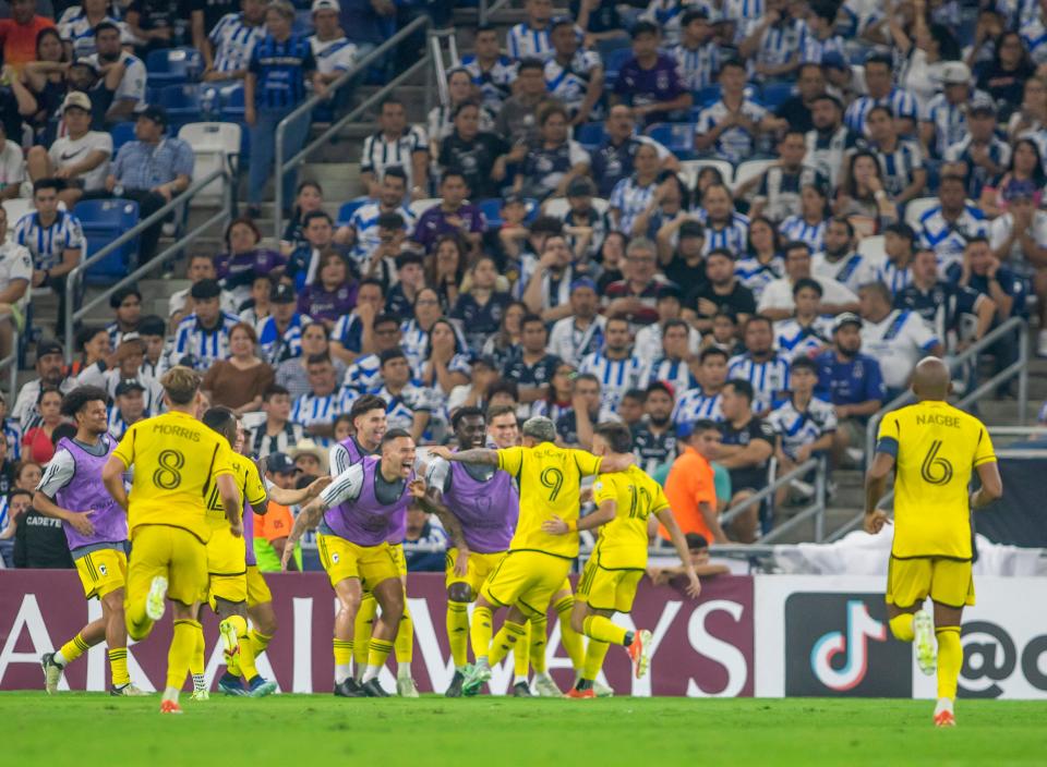 Columbus Crew's Diego Rossi (C) celebrates with teammates after scoring a goal during the Concacaf Champions Cup semi-final second leg football match between Mexico's Monterrey and USA's Columbus Crew at the BBVA Bancomer stadium in Monterrey, Mexico on May 1, 2024. (Photo by Julio Cesar AGUILAR / AFP) (Photo by JULIO CESAR AGUILAR/AFP via Getty Images)