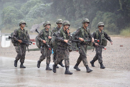 South Korean soldiers take part in a combined arms collective training exercise in Pocheon, South Korea September 19, 2017. REUTERS/Kim Hong-Ji