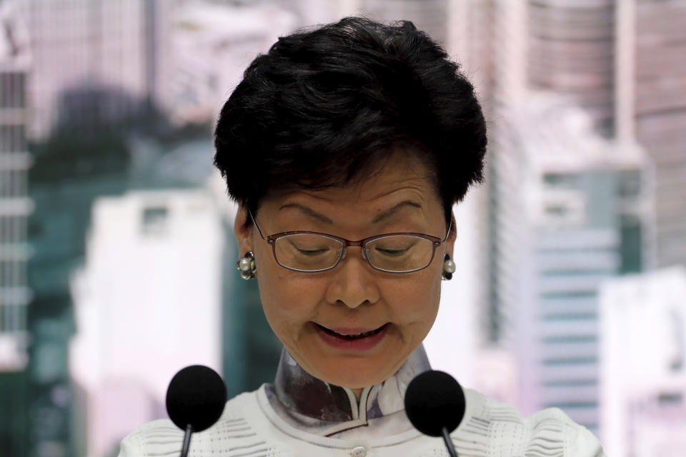 Hong Kong's Chief Executive Carrie Lam speaks at a press conference, Saturday, June 15, 2019, in Hong Kong. Lam said she will suspend a proposed extradition bill indefinitely in response to widespread public unhappiness over the measure, which would enable authorities to send some suspects to stand trial in mainland courts. (AP Photo/Kin Cheung)