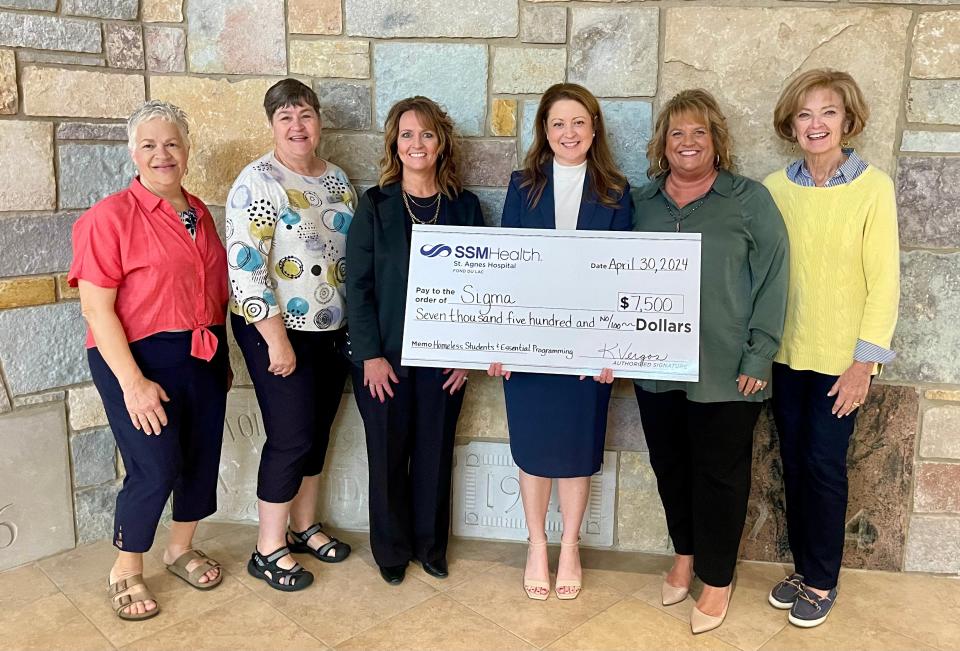 SSM Health is giving $7,500 to Sigma of Fond du Lac, a non-profit women’s organization, to support its annual homeless students program. Pictured are, from left, Sigma members, Barb Piatt, Amy Marx and Arin Boldt; SSM Health St. Agnes Hospital past president Katherine Vergos; and Sigma members Kathy Gravelle and Mary Mueller.