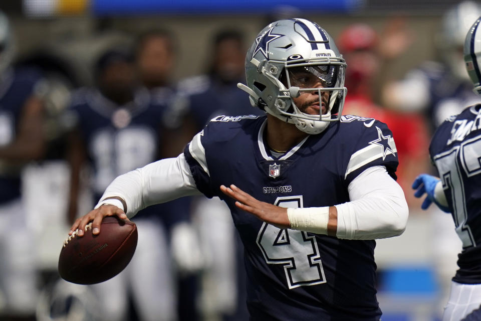 Dallas Cowboys quarterback Dak Prescott (4) throws during the first half of an NFL football game against the Los Angeles Chargers Sunday, Sept. 19, 2021, in Inglewood, Calif. (AP Photo/Gregory Bull )