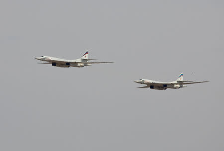 FILE PHOTO: Russian Tu-160 bombers fly during a joint Kazakh-Russian military exercise at Otar military range, some 150km (93 miles) west of Almaty, Kazakhstan, October 3, 2008. REUTERS/Shamil Zhumatov/File Photo