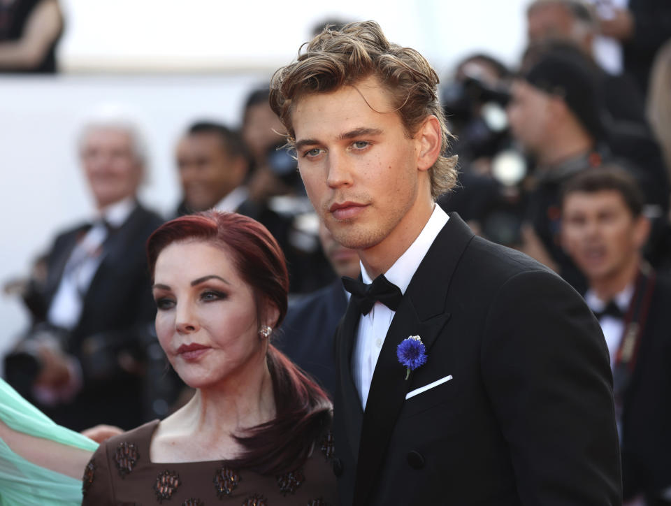 Priscilla Presley, left, and Austin Butler pose for photographers upon arrival at the premiere of the film 'Elvis' at the 75th international film festival, Cannes, southern France, Wednesday, May 25, 2022. (Photo by Vianney Le Caer/Invision/AP)