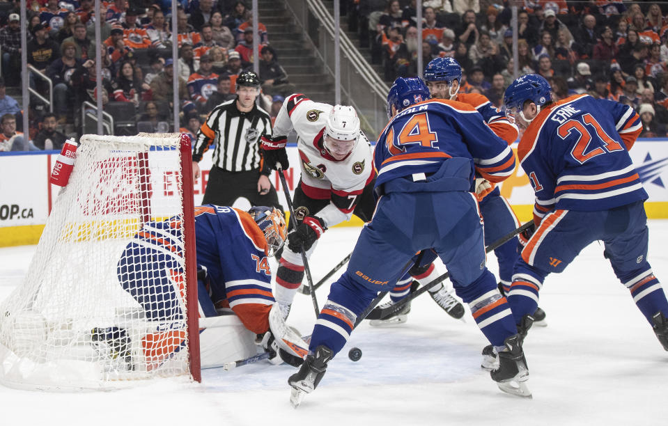 Ottawa Senators' Brady Tkachuk (7) is stopped by Edmonton Oilers goalie Stuart Skinner (74) during the third period of an NHL hockey game Saturday, Jan. 6, 2024, in Edmonton, Alberta. (Jason Franson/The Canadian Press via AP)