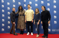 In this May 3, 2019, photo, from left to right, Aaron Ruell (Kip), Shondrella Avery (LaFawnduh), Jon Heder (Napoleon Dynamite), Emily Dunn (Trisha) and Efren Ramirez (Pedro) pose during a photo-op as they celebrate the 15th anniversary of the cult classic comedy "Napoleon Dynamite," in Salt Lake City. (AP Photo/Rick Bowmer)