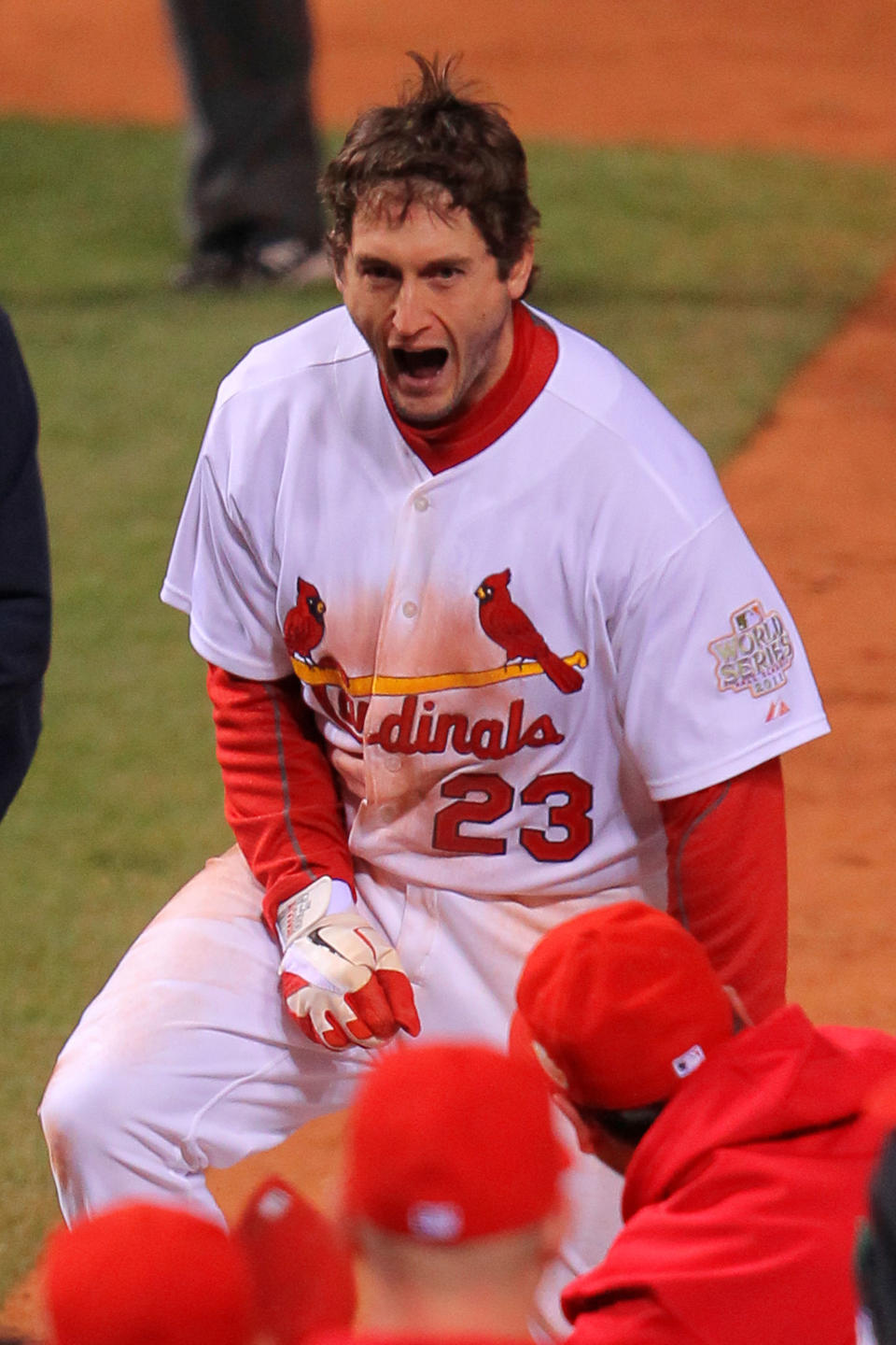 ST LOUIS, MO - OCTOBER 27: David Freese #23 of the St. Louis Cardinals celebrates at home plate after hitting a walk off solo home run in the 11th inning to win Game Six of the MLB World Series against the Texas Rangers at Busch Stadium on October 27, 2011 in St Louis, Missouri. The Cardinals won 10-9. (Photo by Doug Pensinger/Getty Images)