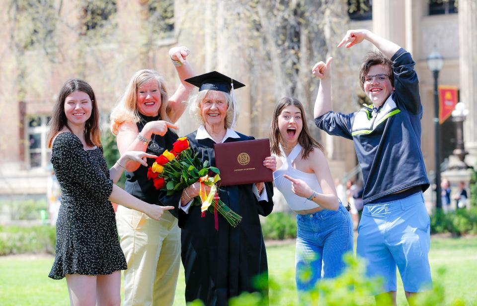 Betty Sandison and her family with her University of Minnesota diploma.