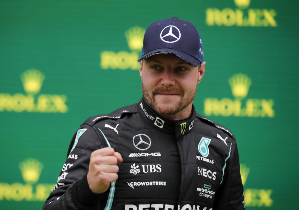 Mercedes driver Valtteri Bottas of Finland celebrates after winning the Turkish Formula One Grand Prix at the Intercity Istanbul Park circuit in Istanbul, Turkey, Sunday, Oct. 10, 2021. (Umit Bektas/Pool via AP)