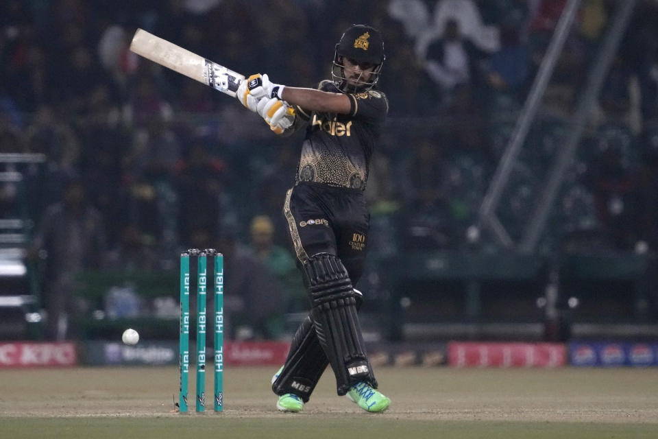 Peshawar Zalmi' Babar Saim Ayub a shot during the Pakistan Super League T20 cricket match between Lahore Qalandars and Peshawar Zalmi, in Lahore, Pakistan, Sunday, Feb. 25, 2024. (AP Photo/K.M. Chaudary)