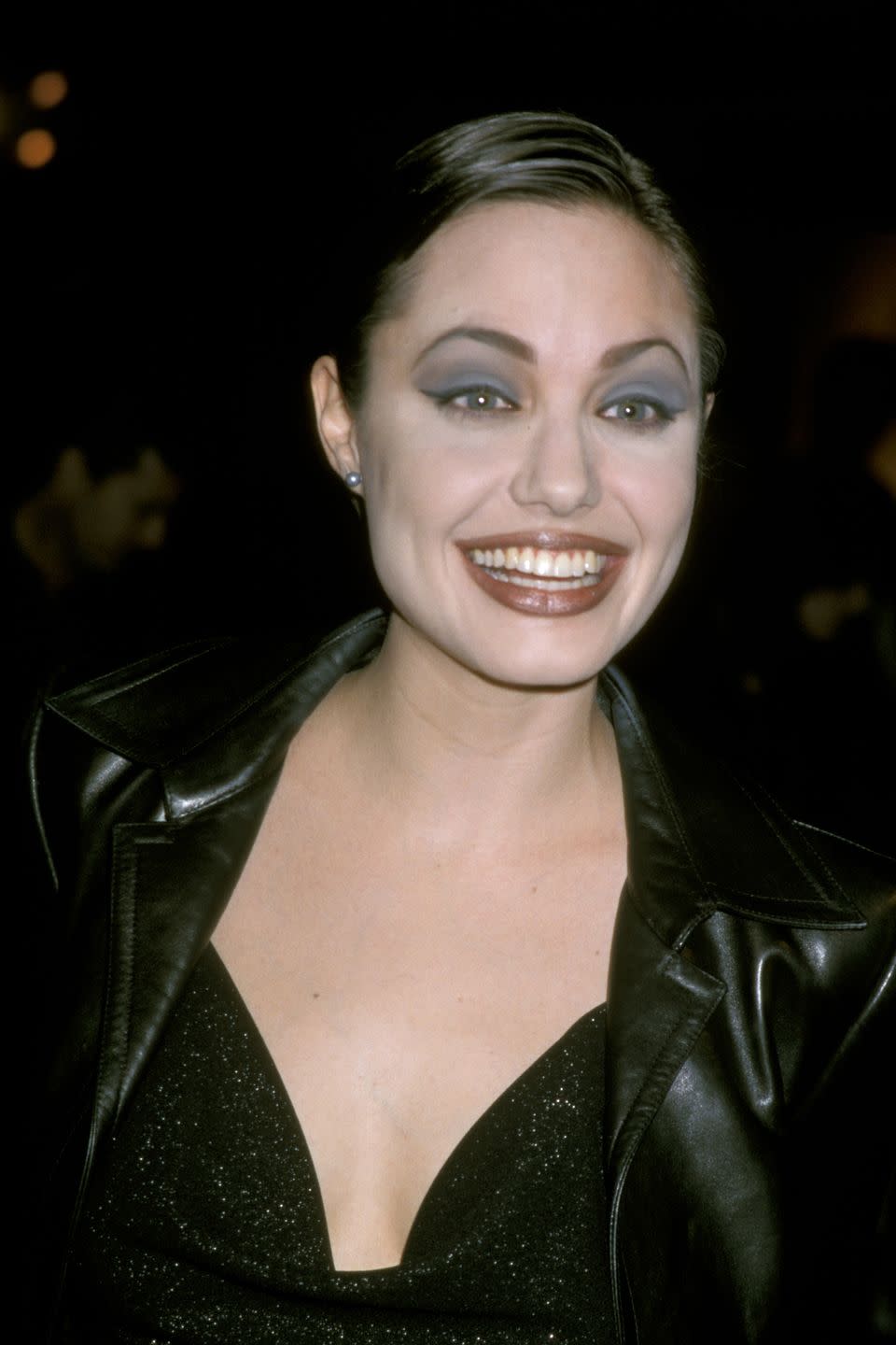 <p>At a <em>Gia</em> screening in January 1998 in quintessential '90s makeup.</p>
