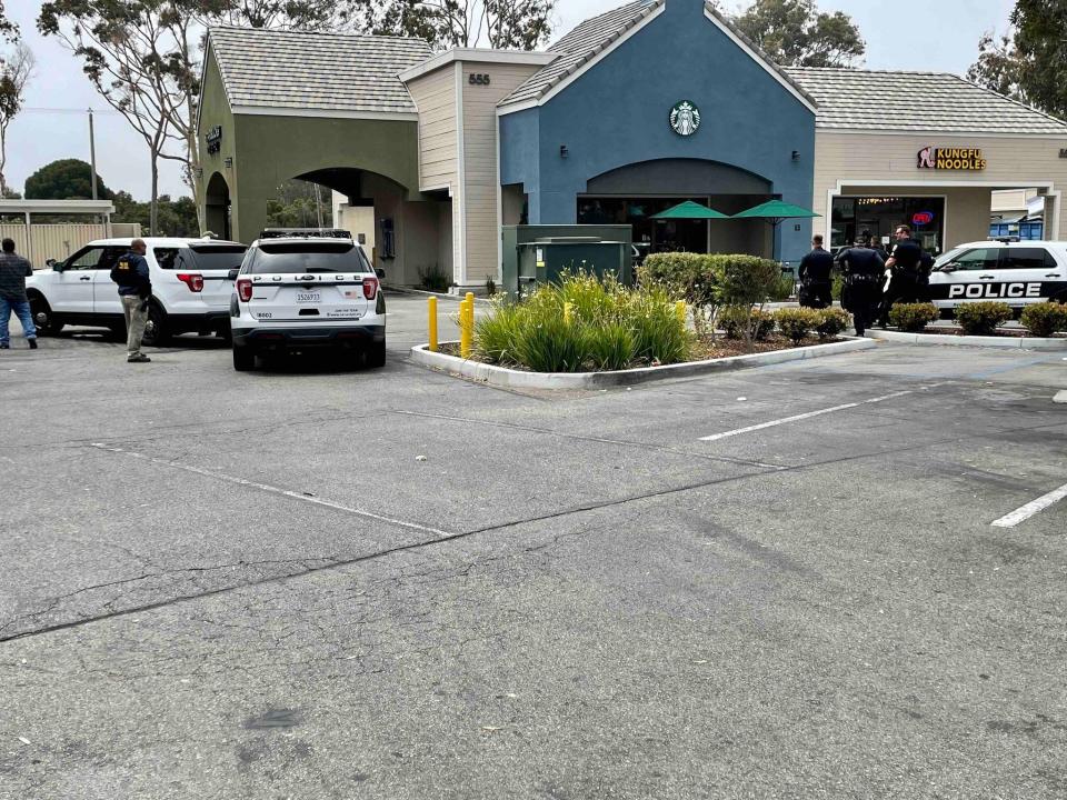 Port Hueneme police arrested a knife-wielding parolee after a nearly two-hour standoff outside a Starbucks on Monday.