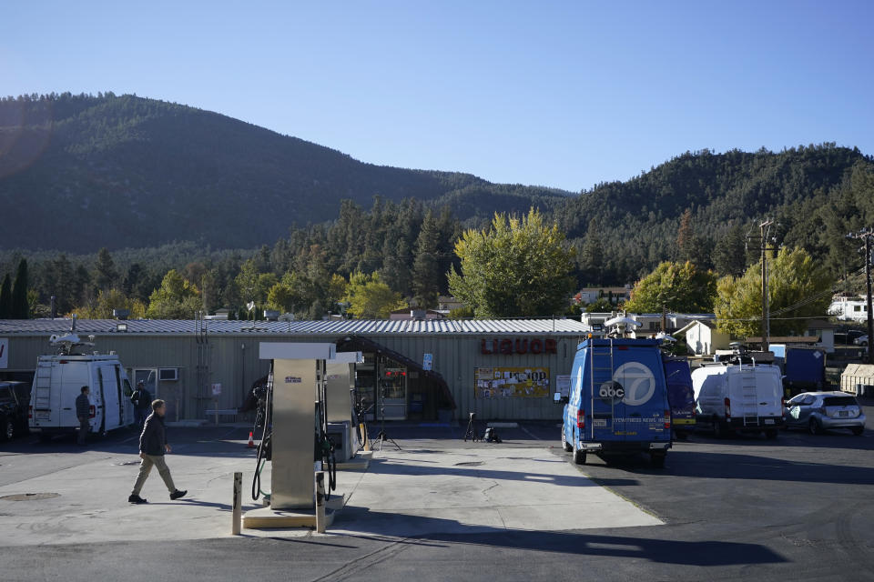 Media gather outside the Midway Market & Liquor store where a winning lottery ticket was sold in Frazier Park, Calif., Thursday, Oct. 12, 2023. A player in California won a $1.765 billion Powerball jackpot Wednesday night, ending a long stretch without a winner of the top prize. (AP Photo/Marcio Jose Sanchez)