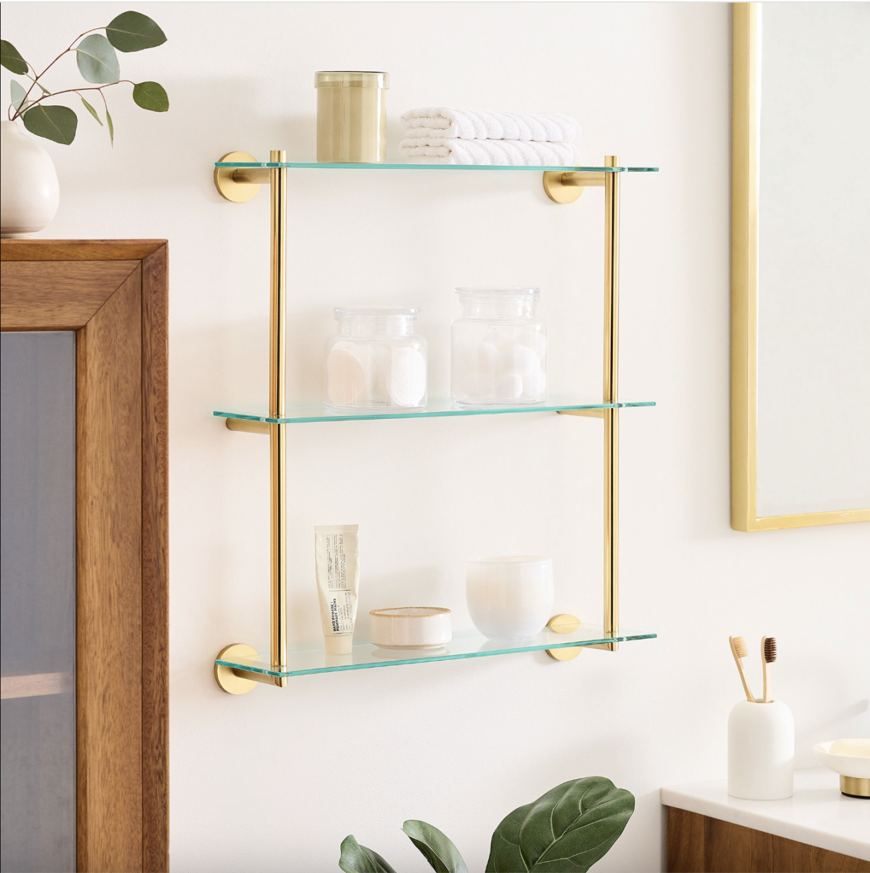 <p><a href="https://go.redirectingat.com?id=74968X1596630&url=https%3A%2F%2Fwww.westelm.com%2Fproducts%2Fmodern-overhang-triple-glass-bathroom-shelf-b4258&sref=https%3A%2F%2Fwww.goodhousekeeping.com%2Fhome%2Fdecorating-ideas%2Fg60204423%2Fover-toilet-storage-ideas%2F" rel="nofollow noopener" target="_blank" data-ylk="slk:Shop Now;elm:context_link;itc:0;sec:content-canvas" class="link rapid-noclick-resp">Shop Now</a></p><p>Keep It Simple With Glass Shelving </p><p>westelm.com</p>