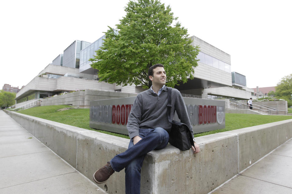 This May 2, 2012 photo shows Daniel Shani on the University of Chicago campus. In June 2012, at 25, Shani graduates with an MBA from the university's Booth School of Business. Up next: a job heading his own company, Energy Intelligence LLC, an alternative energy startup based in Massachusetts. Many of his classmates will join high-powered financial, consulting and marketing firms. But he'll be his own boss, trying to convert a bold idea into a successful venture. (AP Photo/M. Spencer Green)